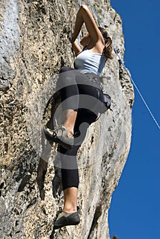 girl rock climbing in Brasov, romania