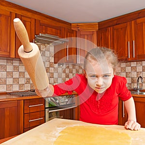 Girl with rolling pin