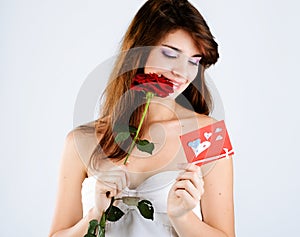 Girl with rose and card