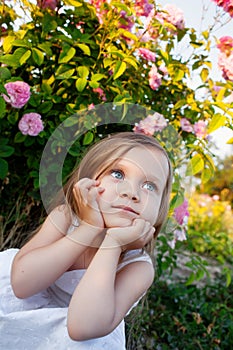 Girl in rose garden