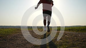 girl run in the park. happy family baby dream concept. happy baby running across the field in nature in wild park