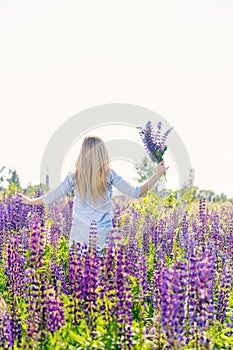 The girl is running across the field