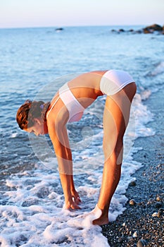 Girl is running on the beach.