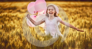 Girl running on cereal field