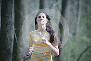 Girl Running in Forest
