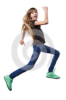 Girl running jumping in air over white background