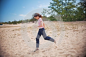 Girl Running in Olkhon Island Sand photo