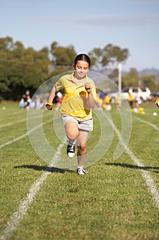 Girl running in race
