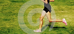 Girl Running a Race on Grass Cross Country Race