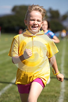 Girl running in sports race