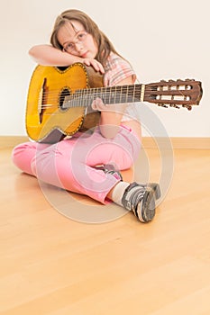 Girl with russian seven-string acoustic guitar