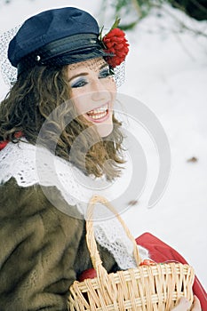 Girl in russian traditonal clothing for maslenitsa