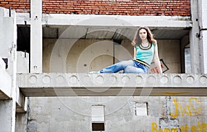 Girl in rusty building