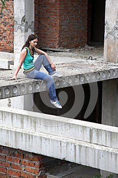 Girl in rusty building