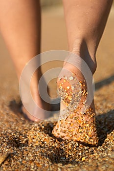 Girl's barefoot legs