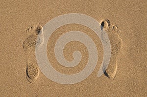 Girl's footprints on send