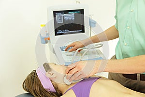 Girl's neck diagnosis with an ultrasound