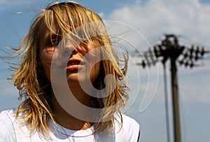 Girl's portrait on sky background