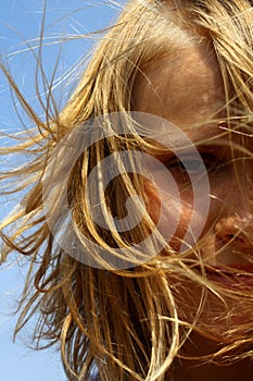 Girl's portrait on sky background photo