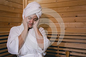 Girl`s in the Sauna room , Refreshing in tropical wood room. To keep the body healthy