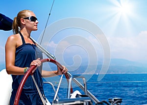Girl Sailing a Sailboat