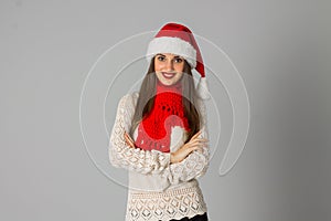 Girl in santa hat and red scarf