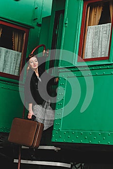 Girl says goodbye on rail platform