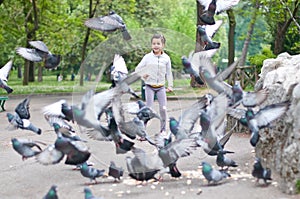 Girl that scares the pigeons