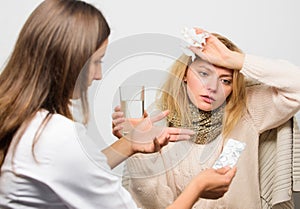 Girl in scarf hold tissue while doctor offer treatment. Cold and flu remedies. Tips how to get rid of cold. Recognize