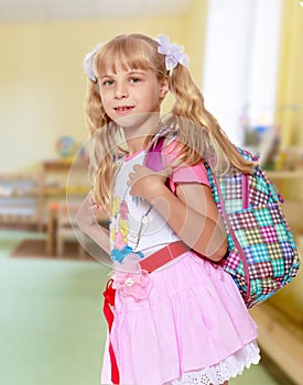 Girl with school backpack