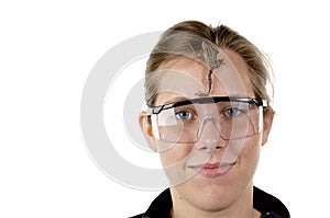 Girl in science class with a frog on her face