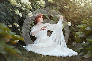 Girl with scissors makes the wedding dress.