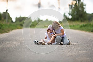 Girl scooter fell In the countryside, sister helps her child