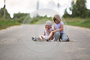 Girl scooter fell In the countryside, sister helps her child