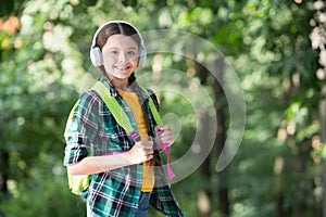 Girl scout cute braids wear checkered clothes nature background, summer hike concept