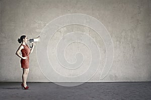 Girl screaming in a megaphone