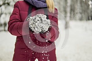 Girl sculpt snow globe in winter forest
