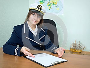 Girl - sea captain with the tablet