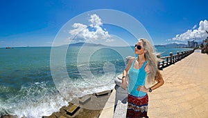 A girl on the seafront at nha trang bay photo