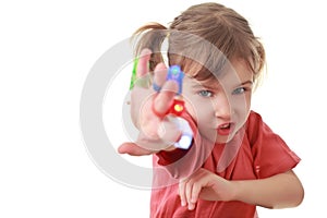 Girl sent hand forward, flashlights on fingers photo
