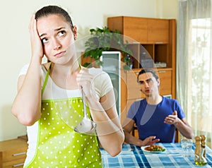 Girl serving lunch her man