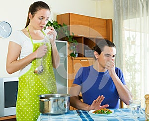 Girl serving lunch her man