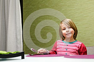 Girl setting table