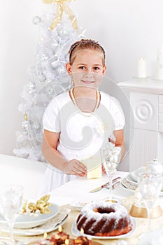 Girl setting table