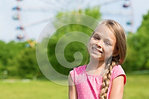 Girl seven years at an amusement park