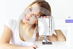 Girl with sewing machine