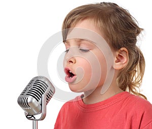 Girl in shirt singing in microphone, half body photo