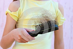 Girl is shocked by amount of hair that has fallen out