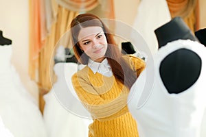 Girl at shop of wedding fashion