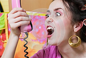 Girl shout with pink phone